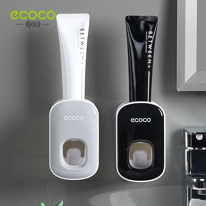 Automatic Toothbrush Holder Dispenser mounted on a bathroom wall