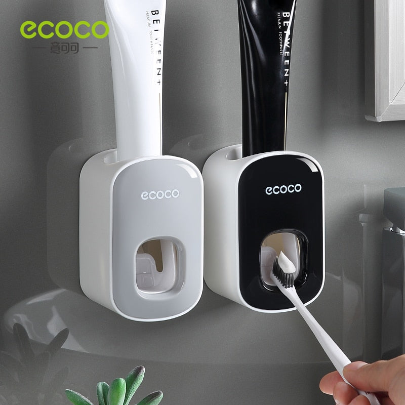 Automatic Toothbrush Holder Dispenser mounted on a bathroom wall