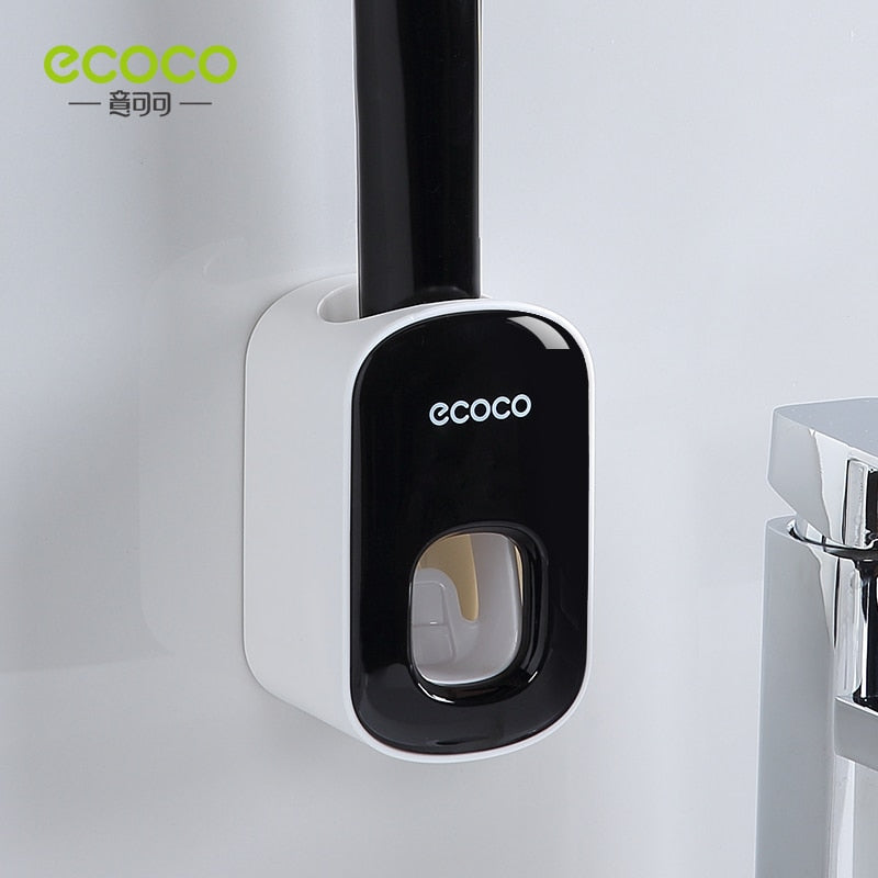 Automatic Toothbrush Holder Dispenser mounted on a bathroom wall