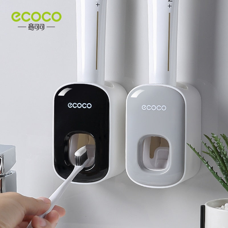 Automatic Toothbrush Holder Dispenser mounted on a bathroom wall