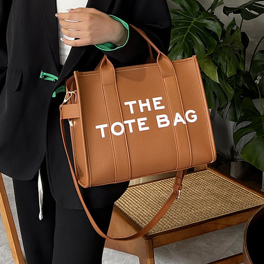 The Tote Handbag - Luxuries